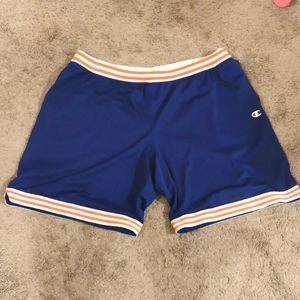 Blue and orange champion basketball shorts.